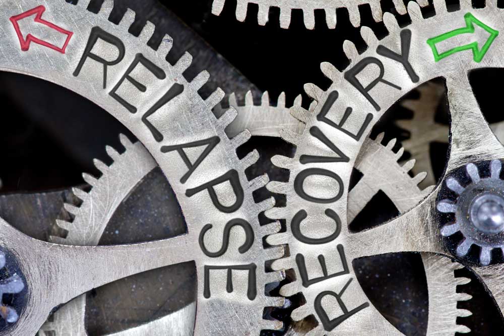 two gears saying relapse and recovery. drug addiction and drug rehabilitation concept.